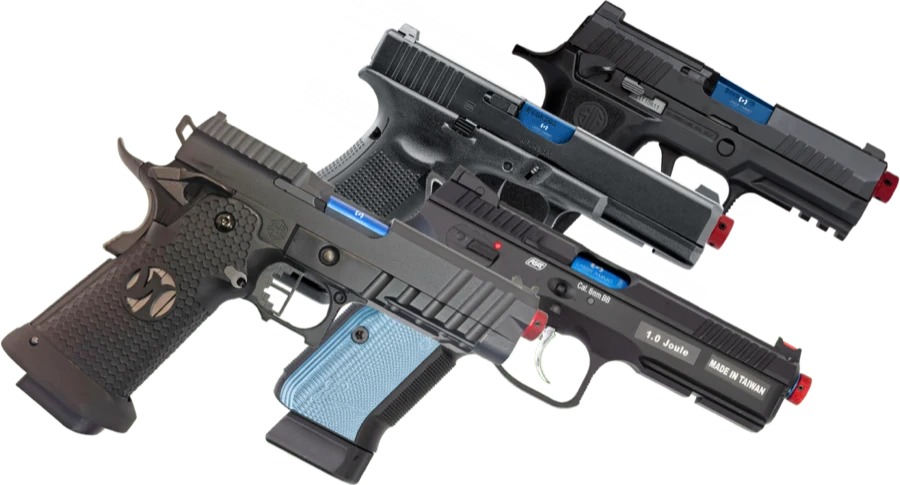 Three competition handguns with custom grips and optics